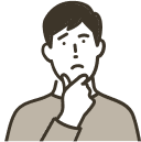 お墓について迷う男性